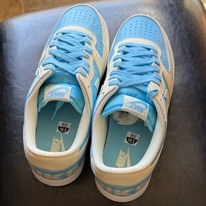Nike Low-Top Sneakers in Sky Blue and Cream